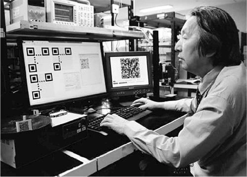 Masahiro Hara creating QR code
